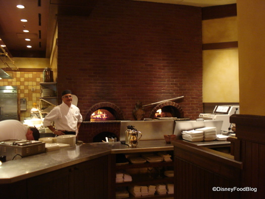 A proud Chef watches over his fires