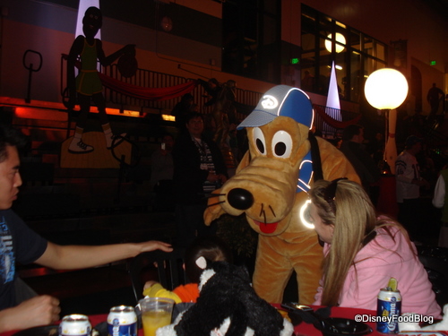 Pluto Greets Guests