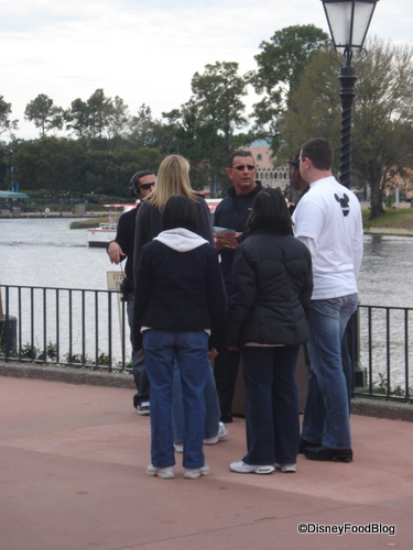 The Chef and His Team Pause to Deliberate