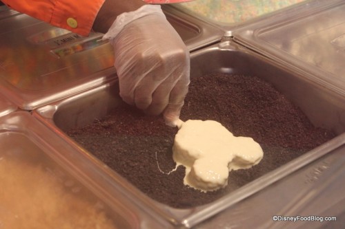 dipping krispie treat into oreos 2