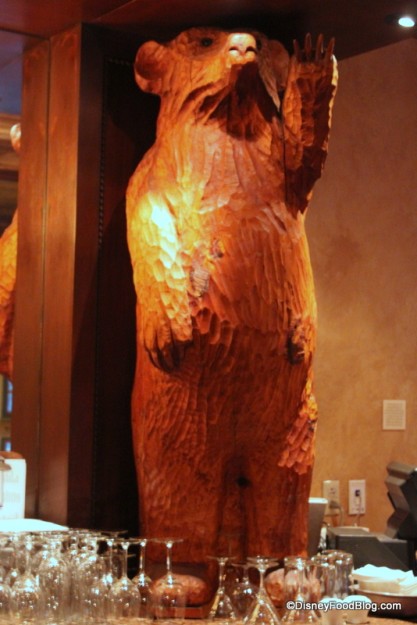 Carved Wooden Bear Holding up the Bar 