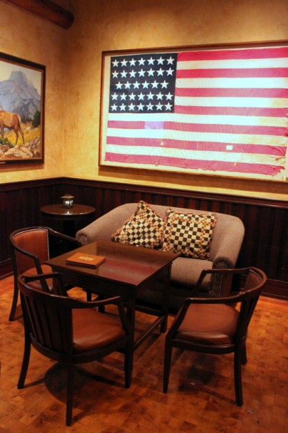 Americana Decor and a Cozy Loveseat Make for an Inviting Space