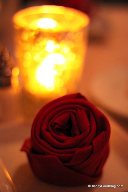 Rose napkin at table setting