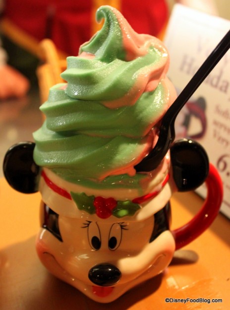 Disney red and green holiday swirl soft serve at Magic Kingdom