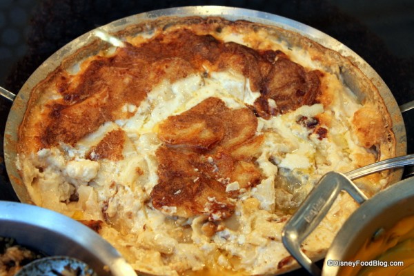 close up of scallopped potatoes Chef Mickey's