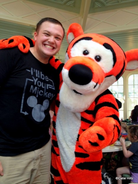 My husband shares a man hug with Tigger