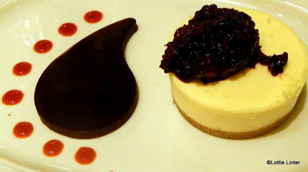 New York cheesecake with a mysterious jelly teardrop