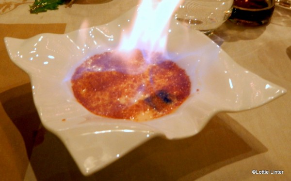 Vanilla crème brûlée, flambéed at the table!