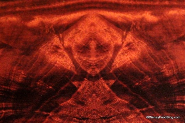 Evil Queen in the Wood Grain of a Table. How Do They Do This Stuff?