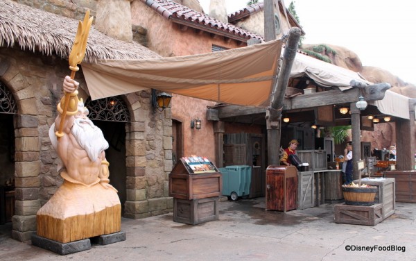 King Triton beside Prince Eric's Village Market