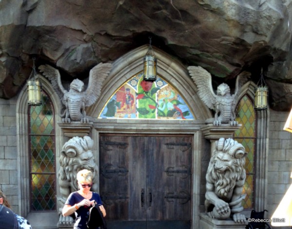 The Entrance of Heavy Wooden Doors with Rose Tile Work