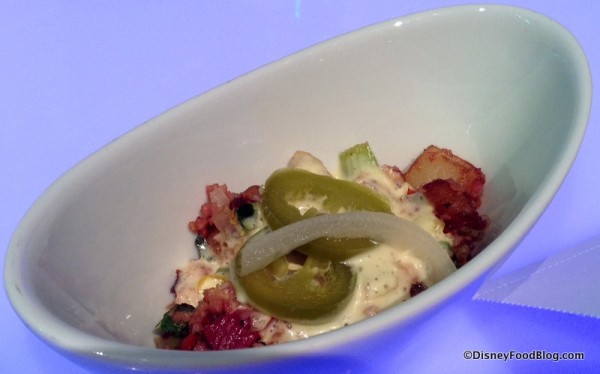 Nueske's Pepper Bacon Hash with Sweet Corn, Potatoes, Hollandaise, and Pickled Jalepenos