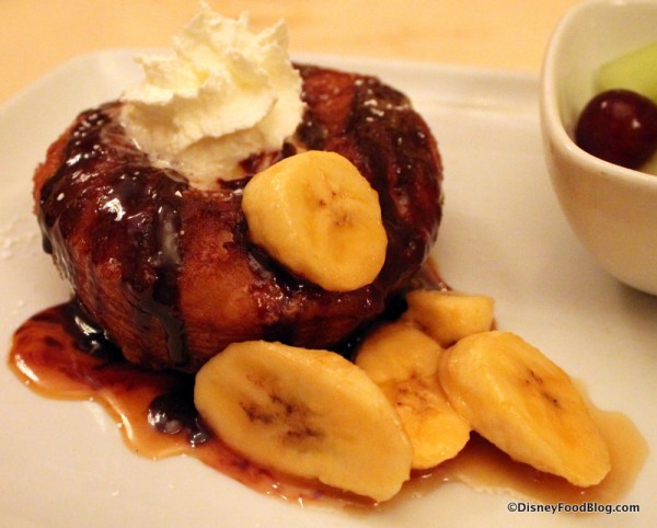 Croissant Doughnut topped with banana caramel sauce, pastry creme, and chocolate ganache
