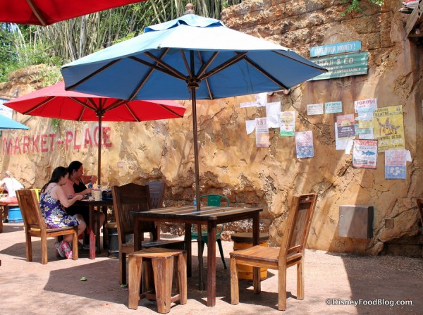 One of many umbrella-topped tables