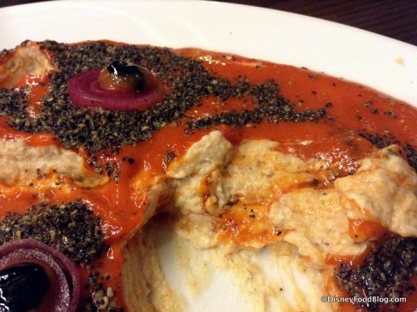 Hummus underneath the coulis