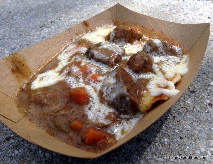 Potato and leek waffle with beer-braised beef and smoked gouda cream