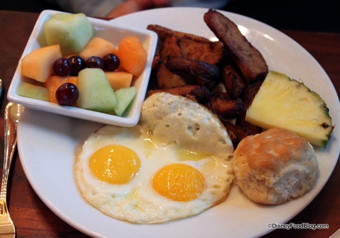 Two fried eggs and sides