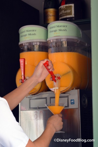 Cast Member Pouring a Grand Marnier Orange Slush
