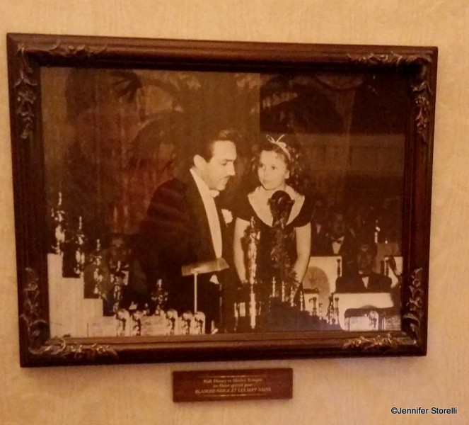 Walt receives an honorary Academy Award for “Snow White and the Seven Dwarfs.”