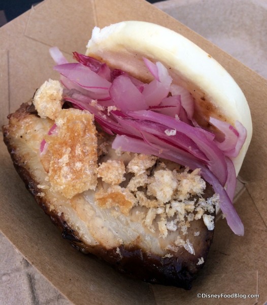 Adobo Pork Bao with shaved red onion and crispy garlic chicharron