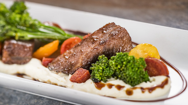 Braised Beef Short Rib with Parsnip Puree, Broccolini, Baby Tomatoes, and Aged Balsamic -- Classic Cuisine Food Studio ©Disney
