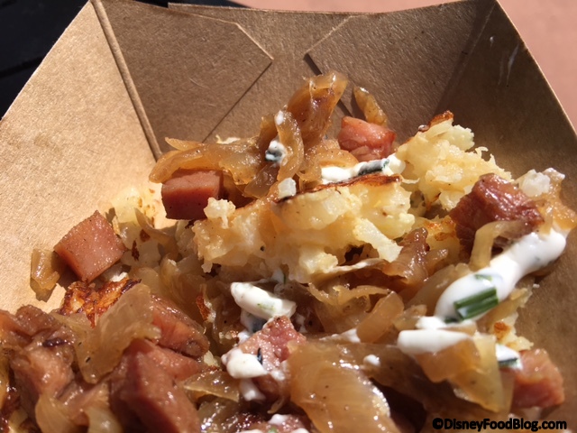 Potato Pancake with Caramelized Ham, Onion, and Herb Sour Cream - close up