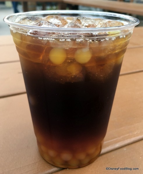 Orange iced tea with orange pearls