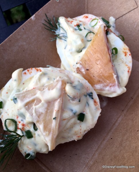 Cage-free cream cheese deviled eggs with farm-raised smoked trout and chives 