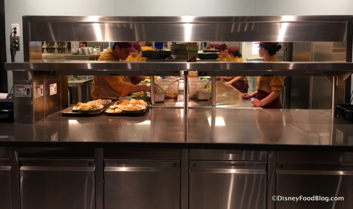 Cast Members assembling orders