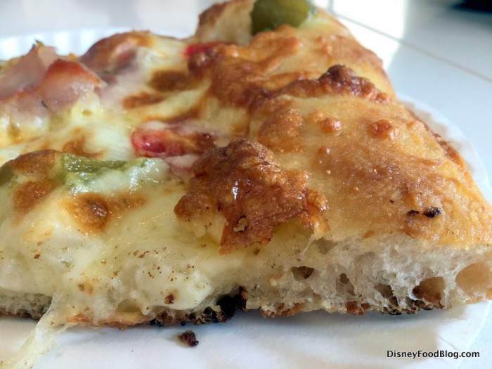 Porchetta pizza -- pancetta, hot peppers, onions