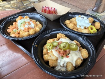 Loaded Tots and Fried Twinkie topped with strawberry sauce