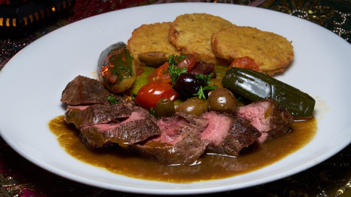 Restaurant Marrakesh's New Pan-Seared Lamb Loin Medallions and Hummus Rosemary Pancakes ©Disney